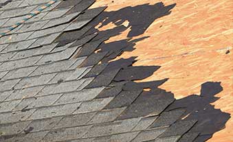 New roof installation with durable asphalt shingles for long lasting protection